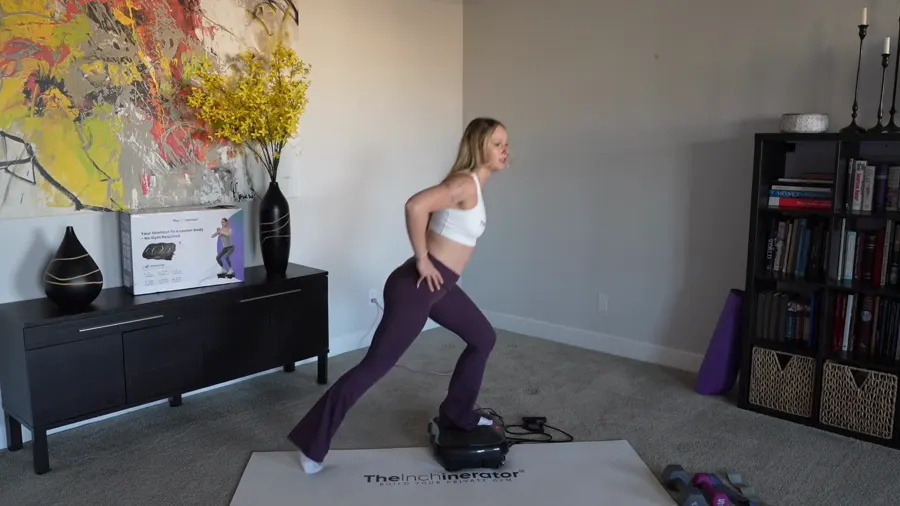 Instructor demonstrating a standing leg movement beside the plate